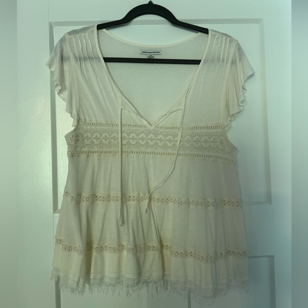 GUC American Eagle Outfitters boho off white top. Frayed edge detail.
